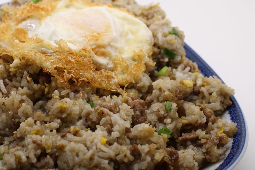 Minced chicken or pork fried rice with spring onions.
