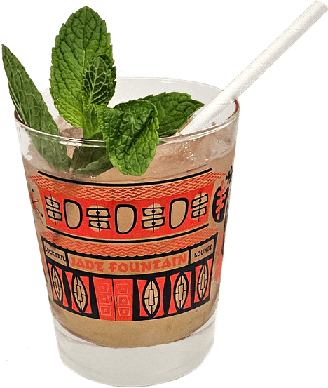 cocktail in Jade Fountain glass with straw and mint garnish