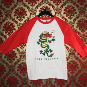 Jade fountain raglan shirt front with a Chinese dragon drinking a martini.