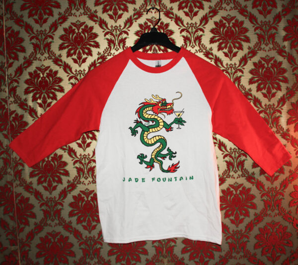 Jade fountain raglan shirt front with a Chinese dragon drinking a martini.