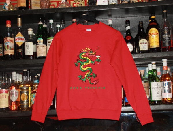 Red Jade Fountain sweatshirt with dragon drinking martini.